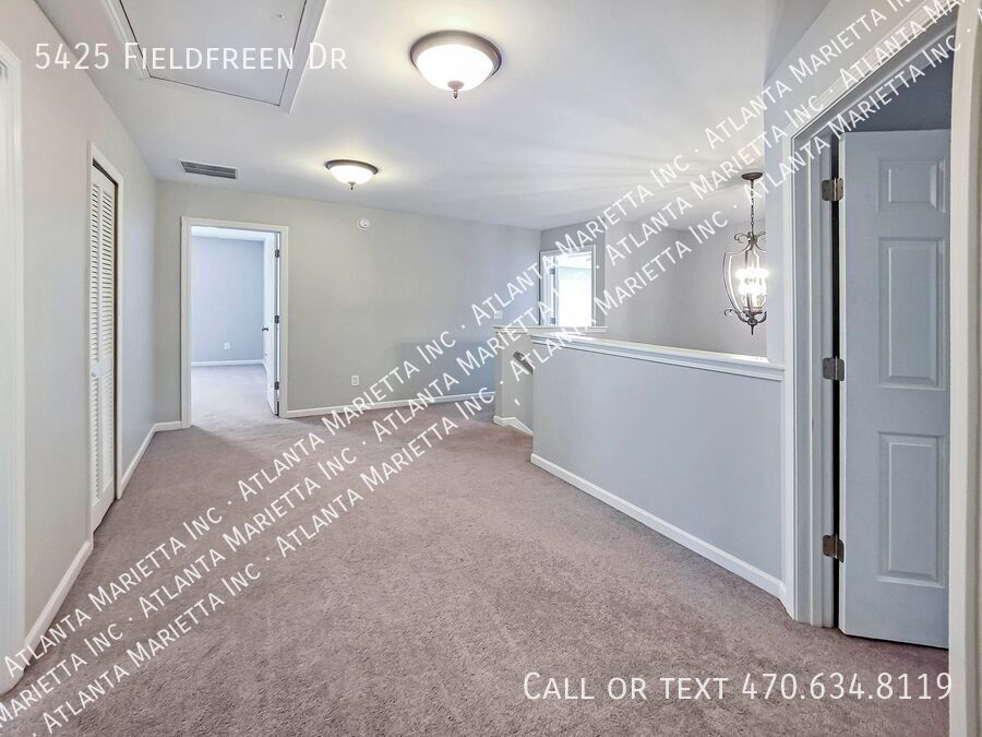 Spacious 4-Bedroom Home in Wild Meadows with Resort-Style Amenities and Top Forsyth Schools property image