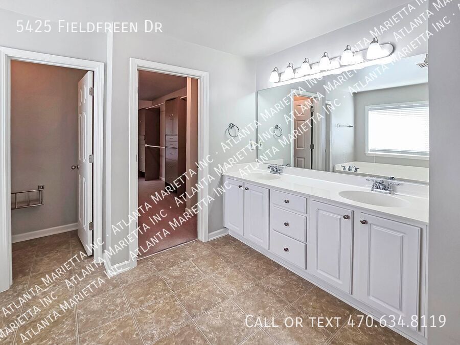 Spacious 4-Bedroom Home in Wild Meadows with Resort-Style Amenities and Top Forsyth Schools property image