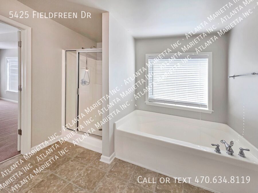 Spacious 4-Bedroom Home in Wild Meadows with Resort-Style Amenities and Top Forsyth Schools property image