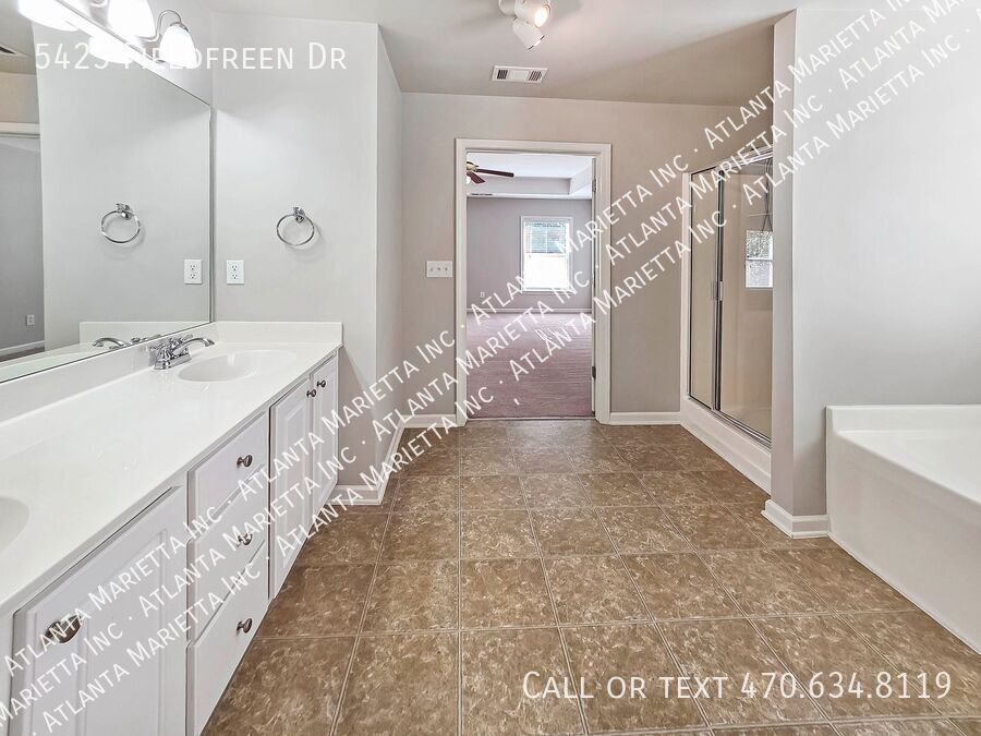 Spacious 4-Bedroom Home in Wild Meadows with Resort-Style Amenities and Top Forsyth Schools property image