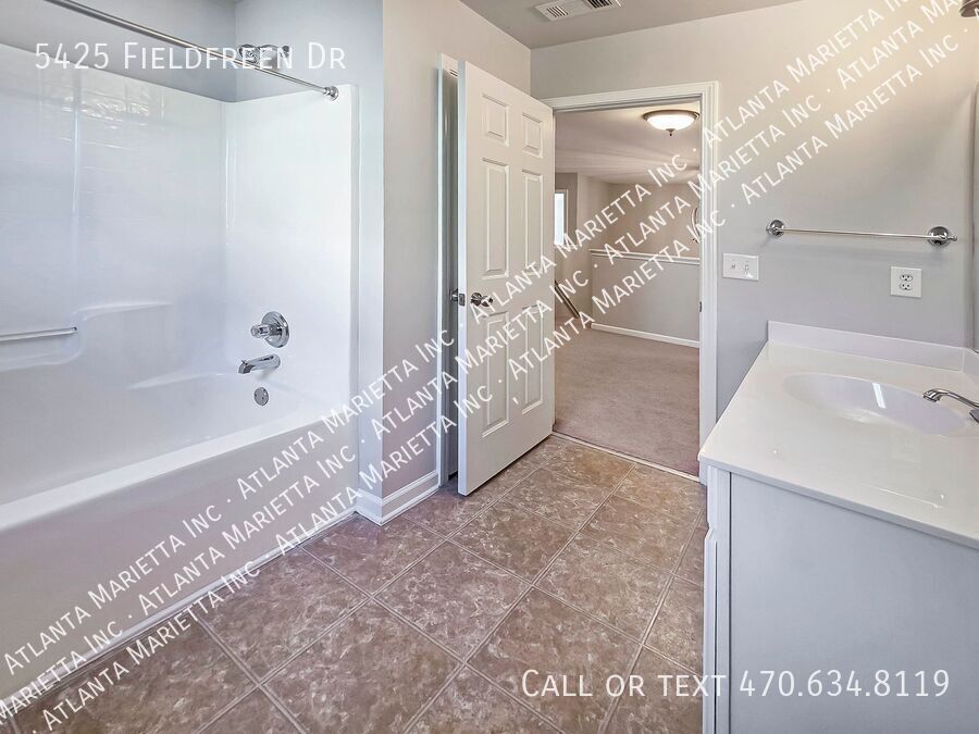 Spacious 4-Bedroom Home in Wild Meadows with Resort-Style Amenities and Top Forsyth Schools property image